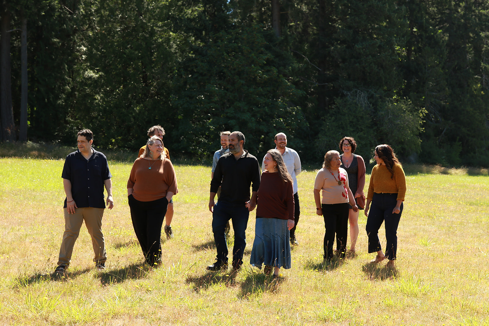 A group walking the Camp Denman property together